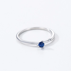 Minimalist S925 sterling silver ring featuring a blue sapphire zircon and accent stone
