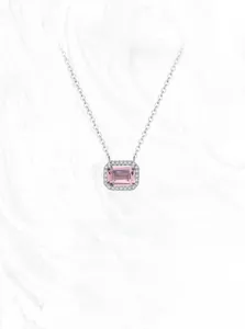 Detail of S925 silver necklace featuring a rectangular pink gemstone with a halo of crystals