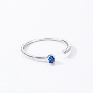 Minimalist 925 silver open ring with round blue gemstone and white pavé cubic zirconia