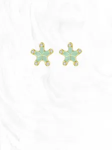 Macro shot of 925 silver starfish earrings with green enamel and tiny crystal accents