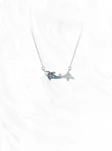 Detail view of 925 sterling silver koi fish pendant with blue enamel and zircon stones