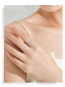 Detail of 925 sterling silver ring featuring lavender and green wavy enamel pattern
