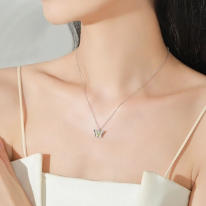 925 sterling silver butterfly pendant necklace with yellow enamel on model neck