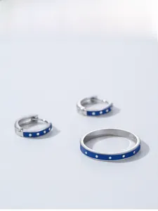 Detailed view of S925 silver jewelry set with blue enamel and white polka dot patterns
