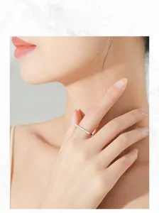 Fashionable S925 sterling silver rainbow enamel U-shaped ring shown on a model finger