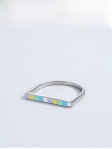 Macro detail of S925 sterling silver U-shaped ring with colorful enamel inlay pattern