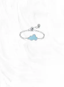 Detail of S925 sterling silver chain ring featuring a blue cloud pendant and S925 hallmark