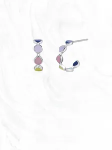 Detail of 925 silver C-shape earrings with colorful marquise-cut resin inlays