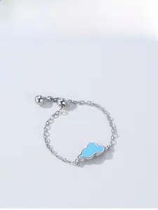 Detail view of S925 silver adjustable chain ring with a light blue enamel cloud charm