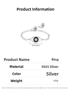 Macro detail of S925 sterling silver evil eye ring with chain band and zircon inlay