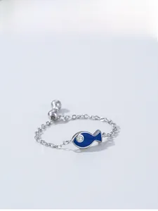 Detail of adjustable S925 silver chain ring with blue enamel fish and zircon eye