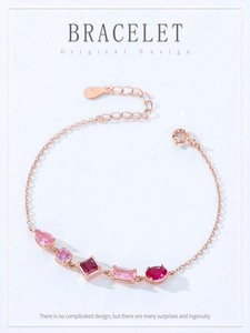 Detail of rose gold S925 silver bracelet with pink and purple zircon gemstones