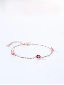 Detail of rose gold plated S925 silver bracelet with pink and red zircon stones