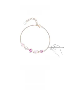 Macro detail of S925 sterling silver rose gold bracelet with pink zircon stones