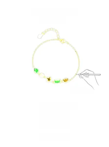 Detail showing the 925 silver gold-plated bracelet with multi-colored gemstones and sketch