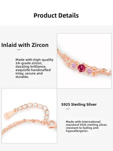 Detail of S925 sterling silver double-layer bracelet with rose gold plating and red zircons