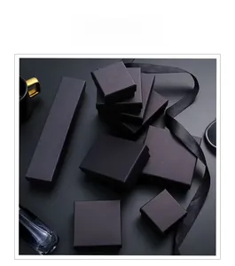 Elegant matte black jewelry packaging gift boxes for necklaces, rings, and bracelets