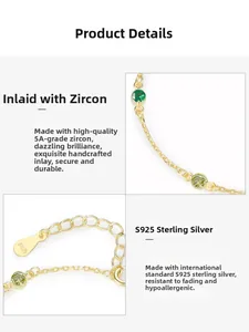 Detail of 925 sterling silver gold bracelet with inlaid green and yellow zircons
