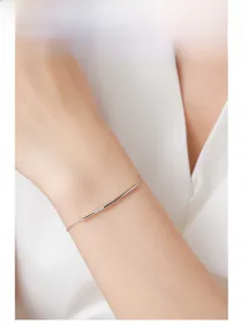 Elegant 925 sterling silver smile line bracelet with sparkling zircon on model wrist