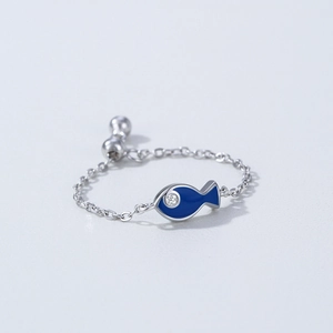 Minimalist S925 sterling silver chain ring featuring a blue enamel fish charm with zircon eye