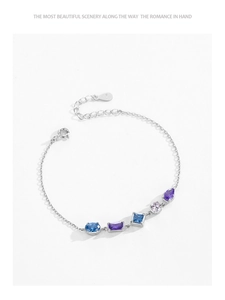 Detail of S925 silver bracelet featuring multi-colored geometric zircon gems on O-chain