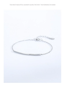 Detail of 925 sterling silver smile bracelet with three inlaid zircons and lobster clasp
