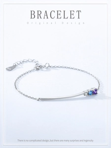 Macro detail of S925 sterling silver bracelet with colorful zircon stones and hallmark
