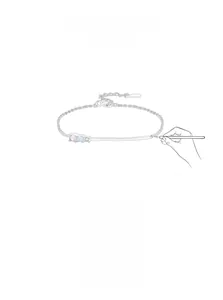 Detail of 925 sterling silver bracelet with pink, purple, and blue cubic zirconia stones