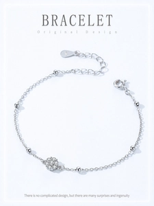 Macro detail of S925 sterling silver flower bracelet with sparkling cubic zirconia stones