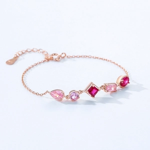 Elegant rose gold S925 silver bracelet featuring a gradient of pink and purple zircons
