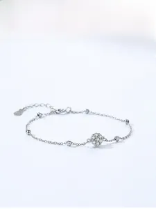 Detailed view of S925 silver bracelet featuring zircon flower charm and beaded chain