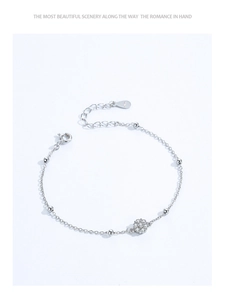 Detail of silver S925 floral bracelet showing diamond cluster and adjustable extension chain