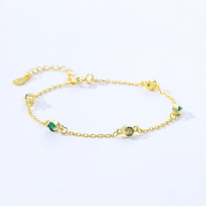 Minimalist 925 silver gold bracelet with green gemstone accents and adjustable chain