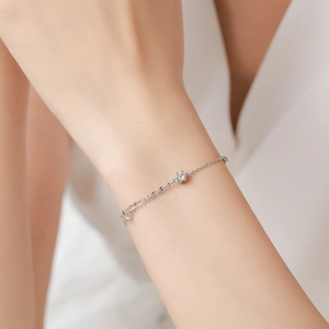 S925 sterling silver double-layer chain bracelet with zircon stones on a model wrist