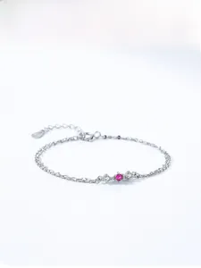 Detail of S925 sterling silver chain with rose red gemstone and S925 engraved tag