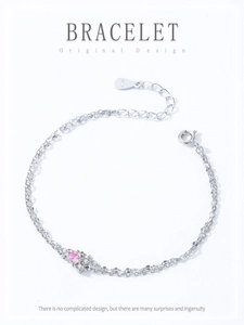 Close-up of S925 sterling silver double-layer bracelet with pink zircon stone detail