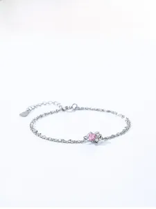 Detailed macro view of S925 silver bracelet featuring a pink heart-shaped zircon stone