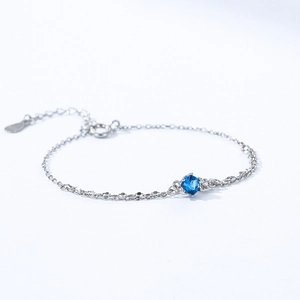 Bracelet double rang en argent 925 avec une pierre ronde en zircon bleu brillant