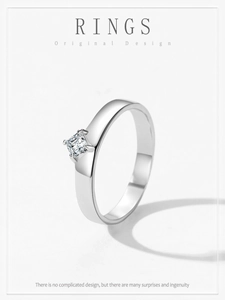 Detailed view of square princess cut zircon stone set in minimalist silver ring band