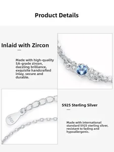 Detail of S925 sterling silver tag and blue zircon stone on double-layer bracelet