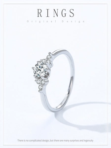 Macro detail of 925 silver ring featuring a central round diamond and side accents