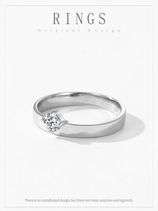 Close-up of a brilliant round-cut diamond set on a polished S925 silver ring band