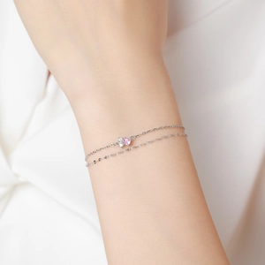 Minimalist S925 sterling silver double layer bracelet with pink and white zircons on wrist