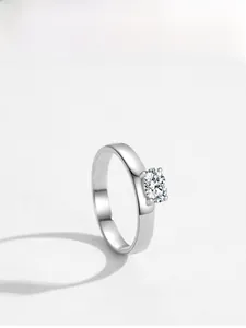 Macro shot of 925 sterling silver ring with classic four-prong round zircon setting
