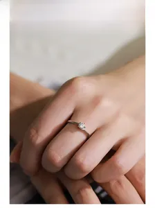 Classic S925 sterling silver ring with a sparkling round-cut zircon in a six-prong setting