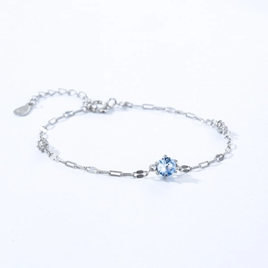 Bracelet élégant en argent sterling 925 avec une pierre de zircon bleu clair brillant