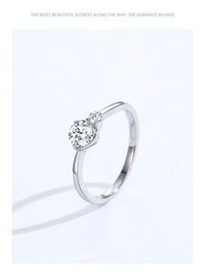Macro detail of S925 sterling silver ring with two round cubic zirconia stones