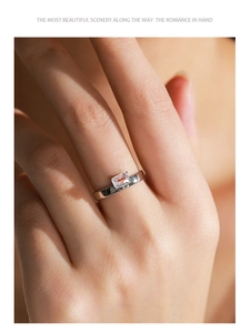 Close-up of S925 sterling silver ring with a rectangular cubic zirconia on a finger