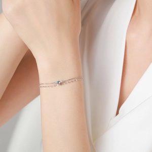 Elegant S925 sterling silver double-layer bracelet with ice blue and white cubic zirconia