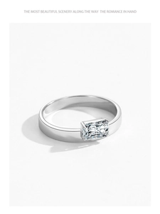 Close-up of a silver S925 square cut zircon ring with geometric half-bezel setting